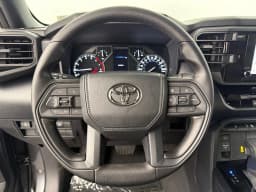 Toyota Tundra 4WD SR CrewMax 5.5' Bed (Natl) 2026 — side view
