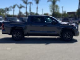 Toyota Tundra 4WD Platinum CrewMax 5.5' Bed (Natl) 2026 — side view