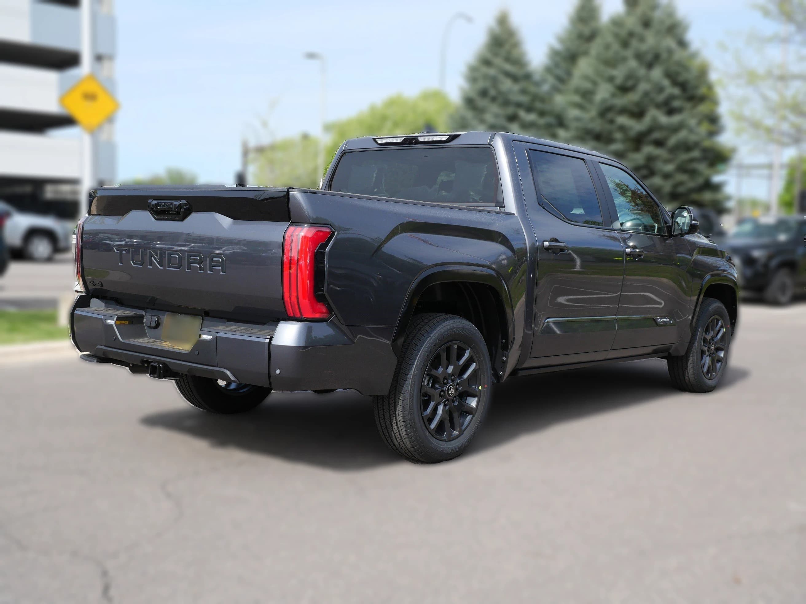 Toyota Tundra 4WD Platinum CrewMax 5.5' Bed (Natl) 2026 — side view