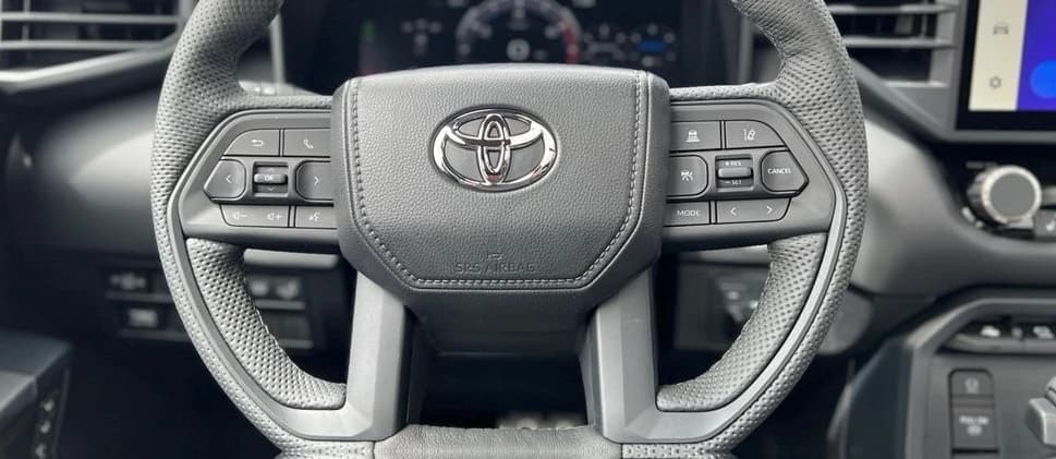 Toyota Tundra 4WD TRD Pro Hybrid CrewMax 5.5' Bed (Natl) 2026 — side view