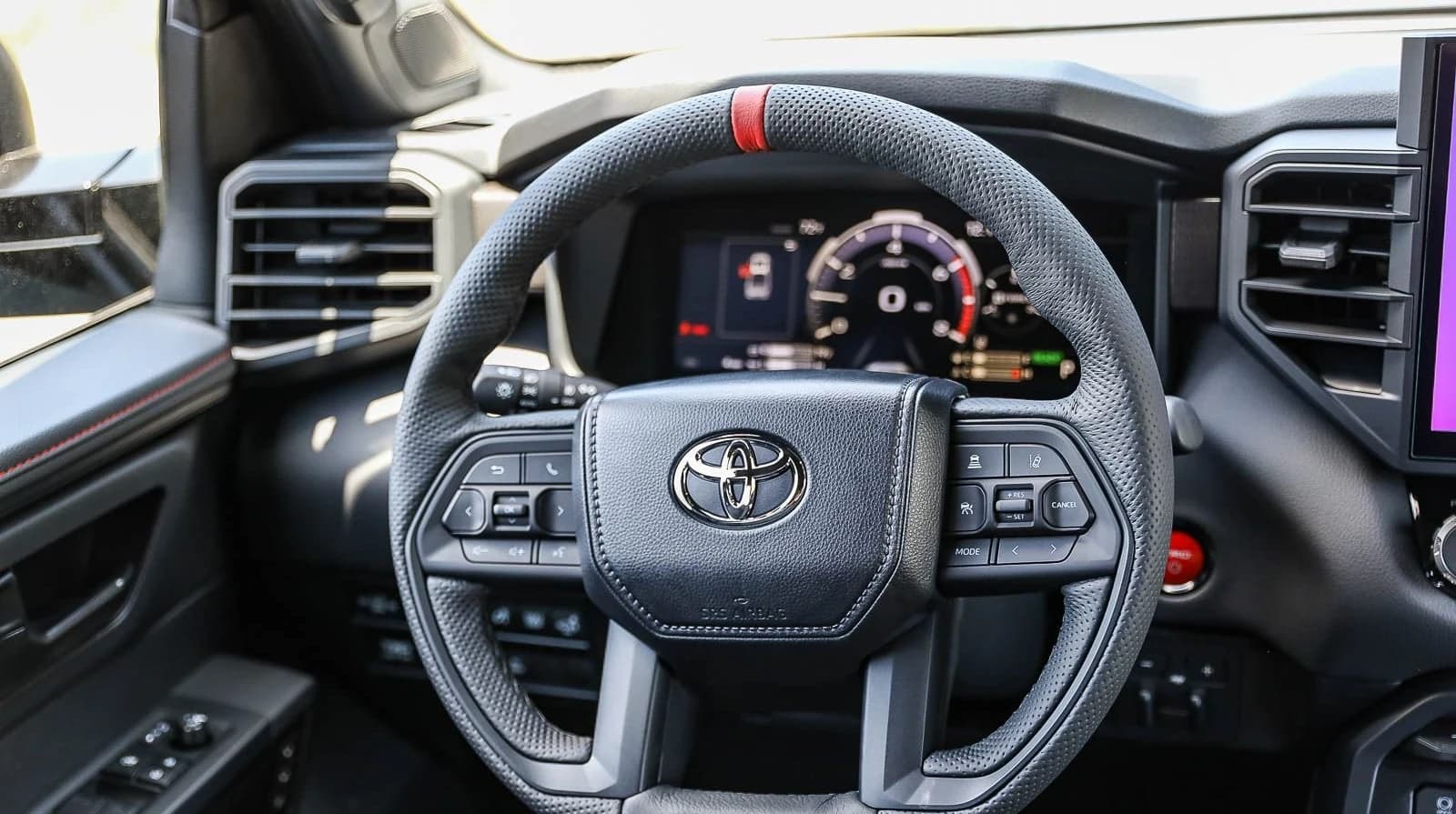 Toyota Tundra 4WD TRD Pro Hybrid CrewMax 5.5' Bed (Natl) 2026 — side view