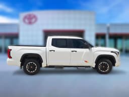Toyota Tundra 4WD Limited CrewMax 5.5' Bed (Natl) 2026 — side view