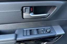 Toyota Tundra 4WD Limited CrewMax 5.5' Bed (Natl) 2026 — side view