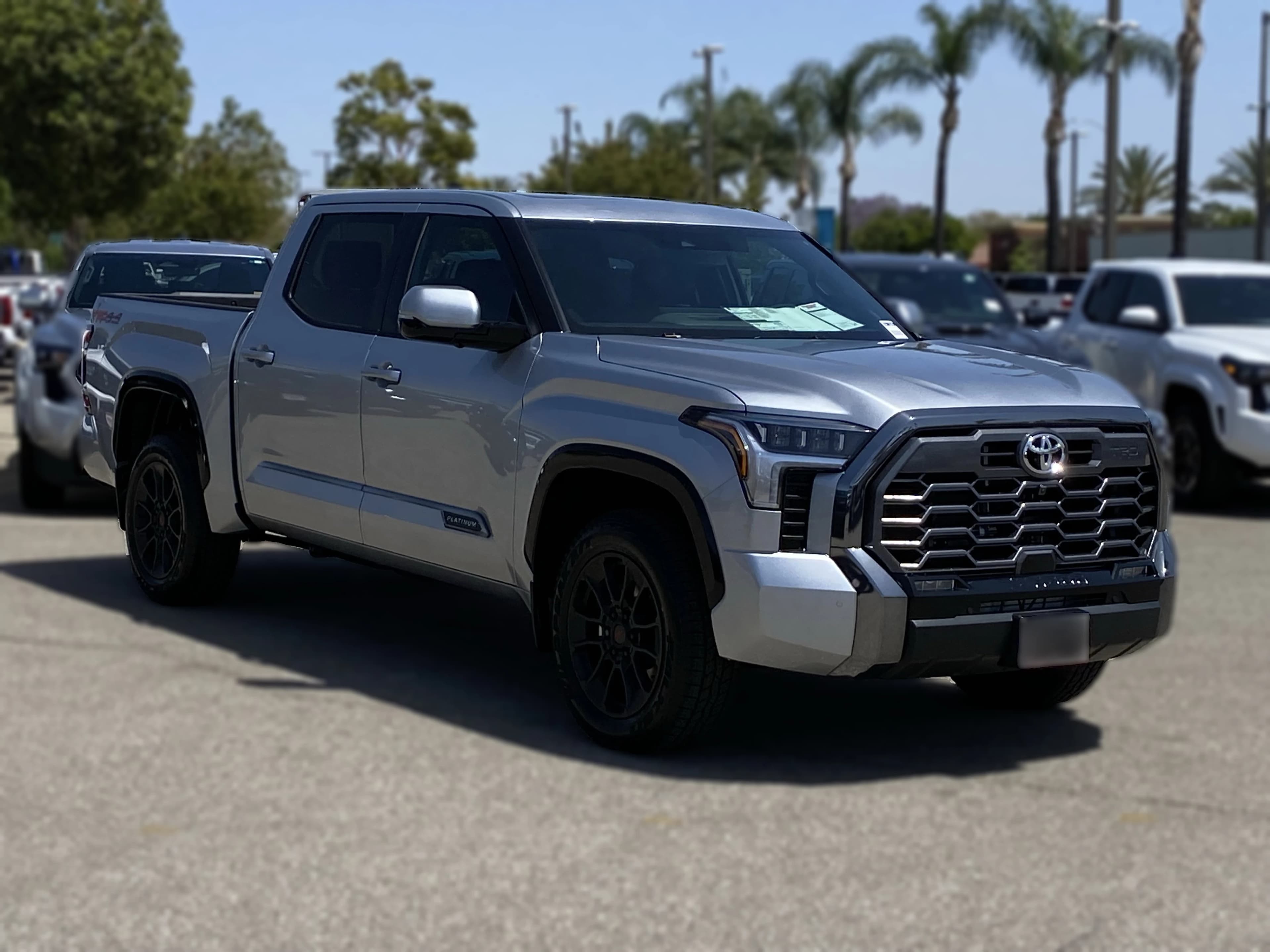 Toyota Tundra 4WD Platinum CrewMax 5.5' Bed (Natl) 2026 — side view