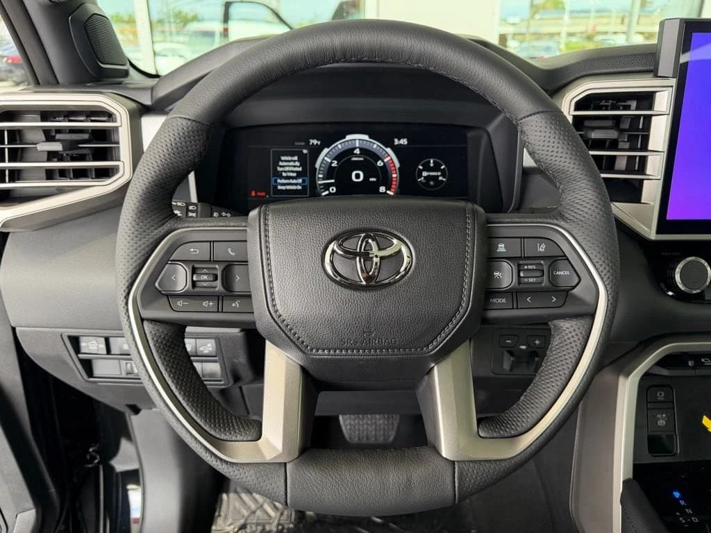 Toyota Tundra 4WD Limited CrewMax 5.5' Bed (Natl) 2026 — side view