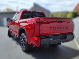 Toyota Tundra 4WD Limited CrewMax 5.5' Bed (Natl) 2026 — side view