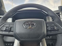 Toyota Tundra 4WD Limited CrewMax 5.5' Bed (Natl) 2026 — side view