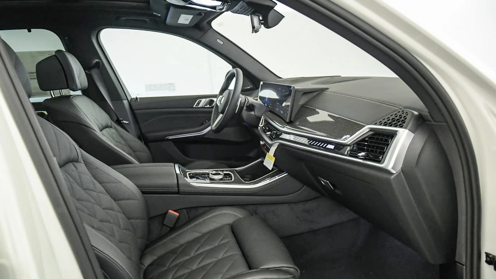 BMW X5 M60i Sports Activity Vehicle 2026 — side view