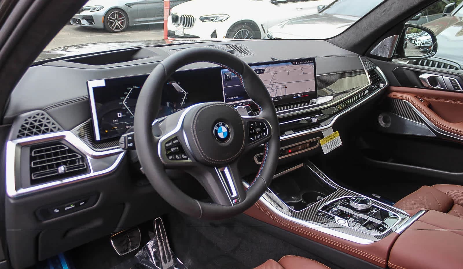 BMW X5 M60i Sports Activity Vehicle 2026 — side view
