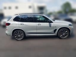 BMW X5 M60i Sports Activity Vehicle 2026 — side view