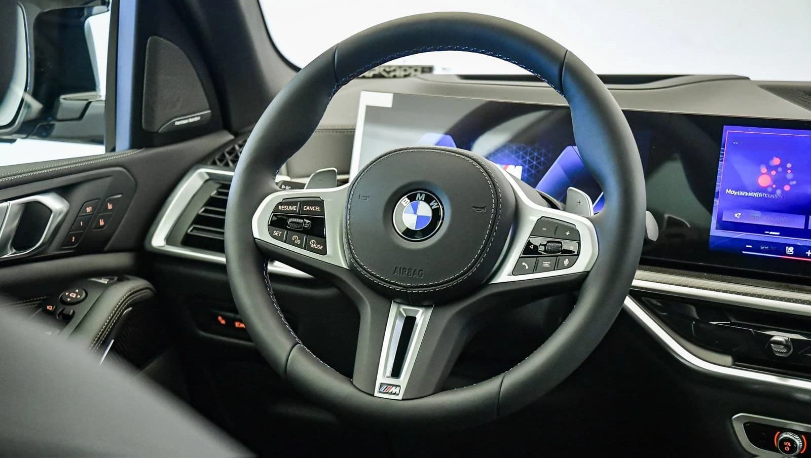 BMW X5 M60i Sports Activity Vehicle 2026 — side view
