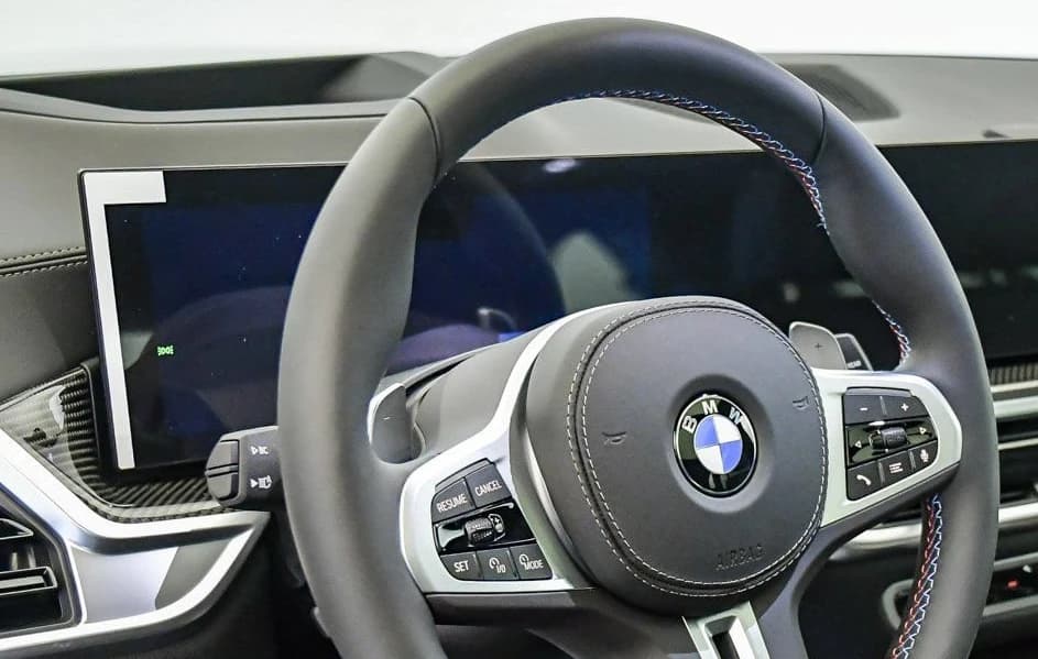 BMW X5 M60i Sports Activity Vehicle 2026 — side view