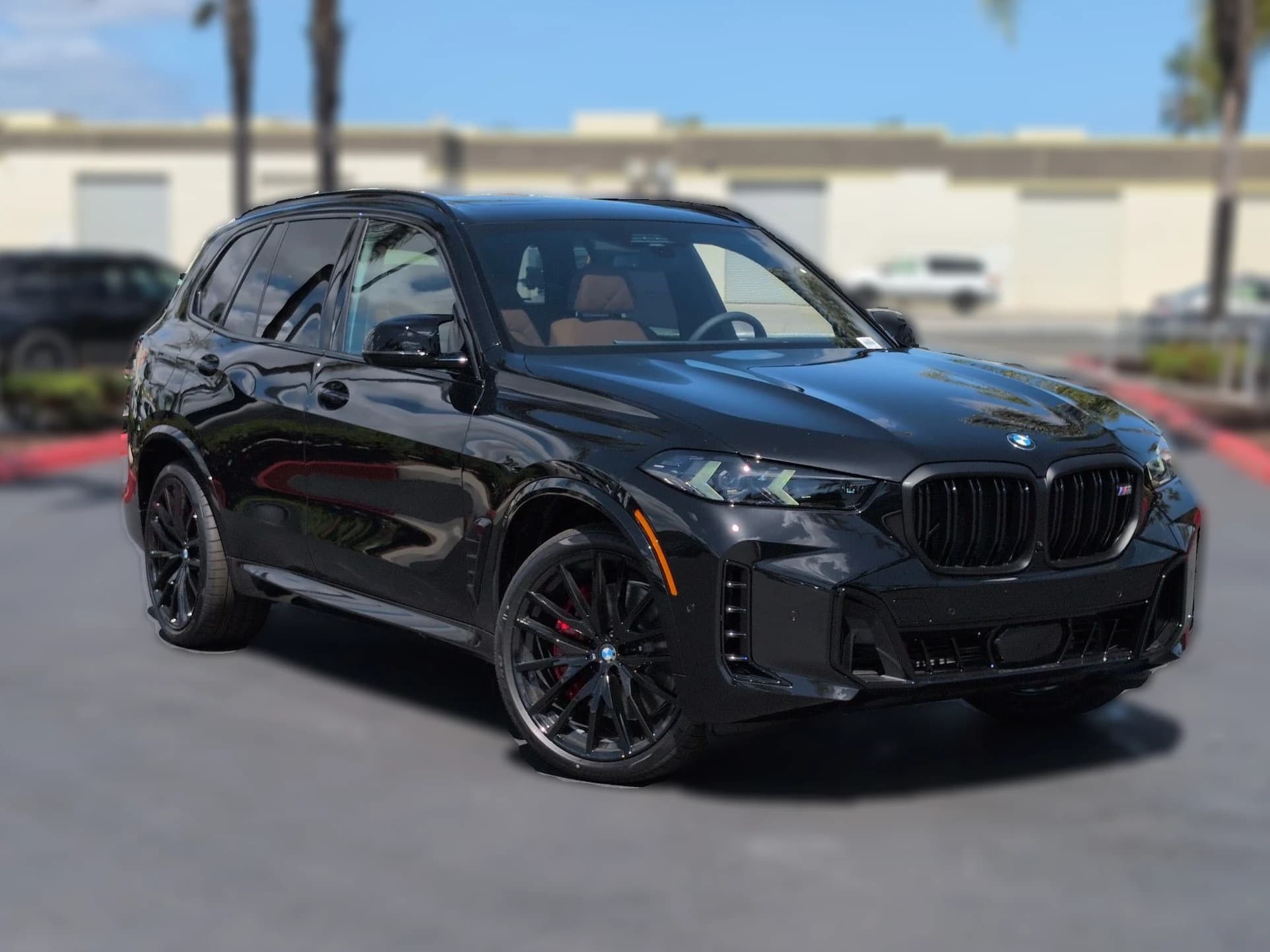 BMW X5 M60i Sports Activity Vehicle 2026 — side view