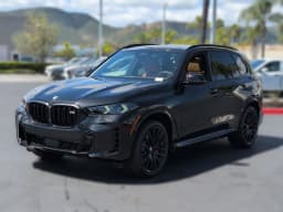 BMW X5 M60i Sports Activity Vehicle 2026 — side view