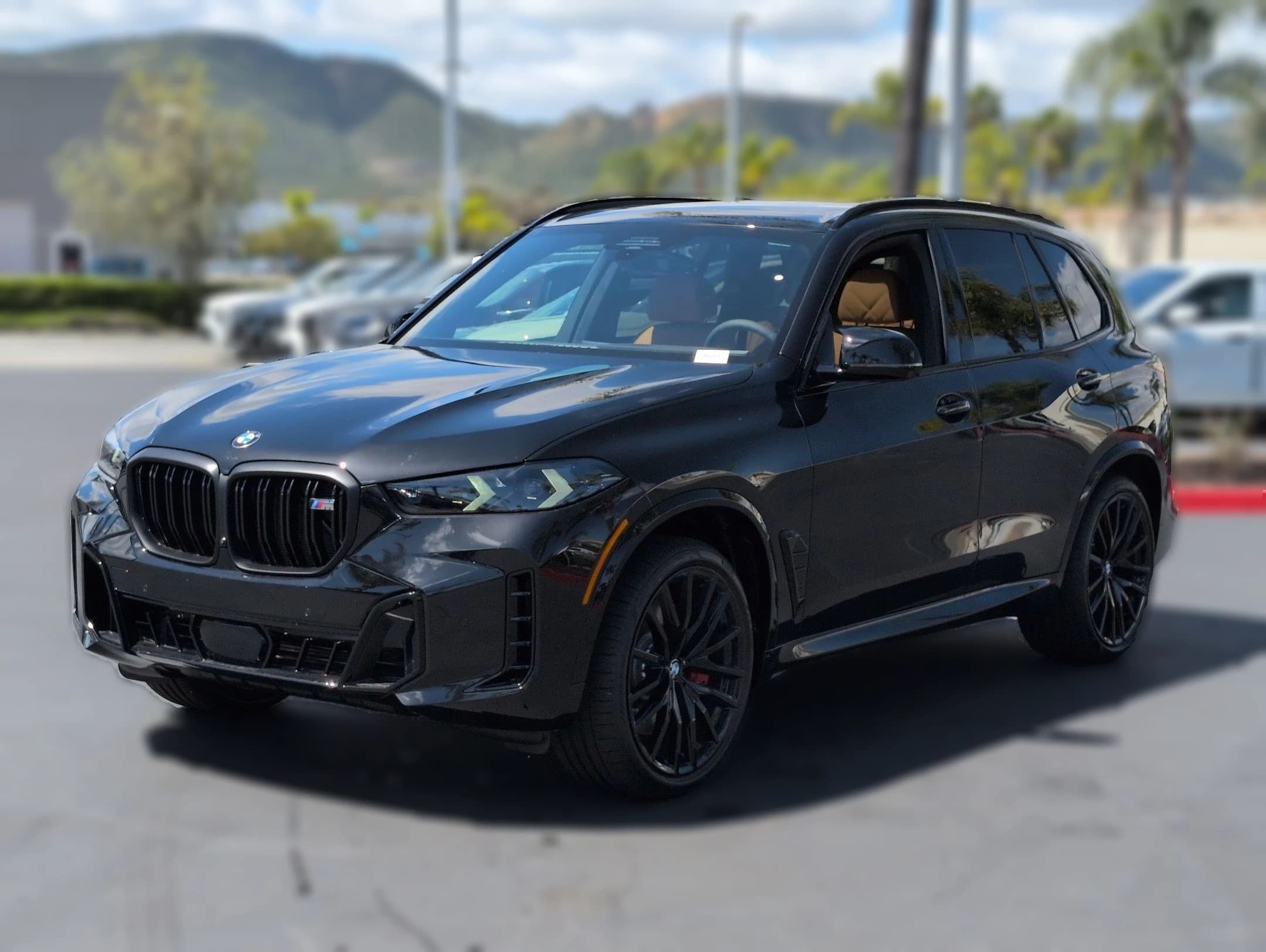 BMW X5 M60i Sports Activity Vehicle 2026 — side view