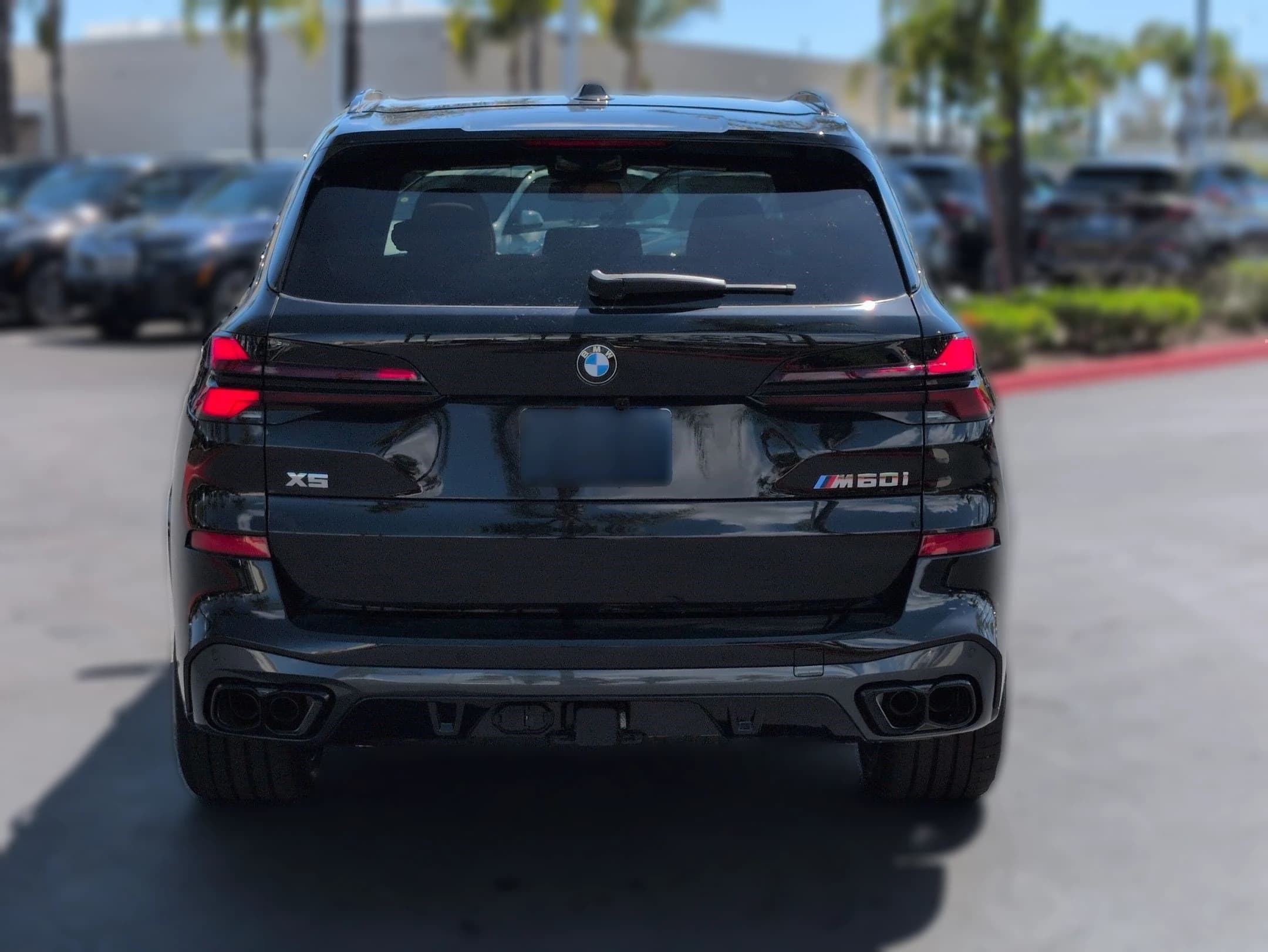 BMW X5 M60i Sports Activity Vehicle 2026 — side view