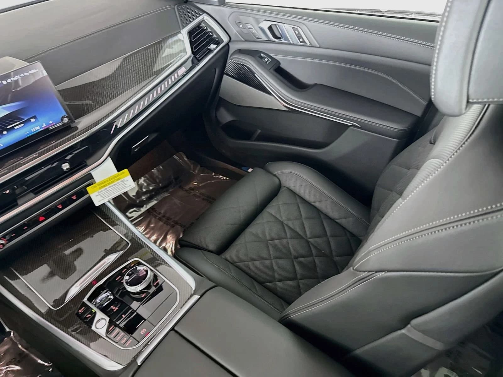 BMW X5 M60i Sports Activity Vehicle 2026 — side view