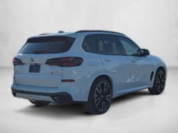 BMW X5 M60i Sports Activity Vehicle 2026 — side view