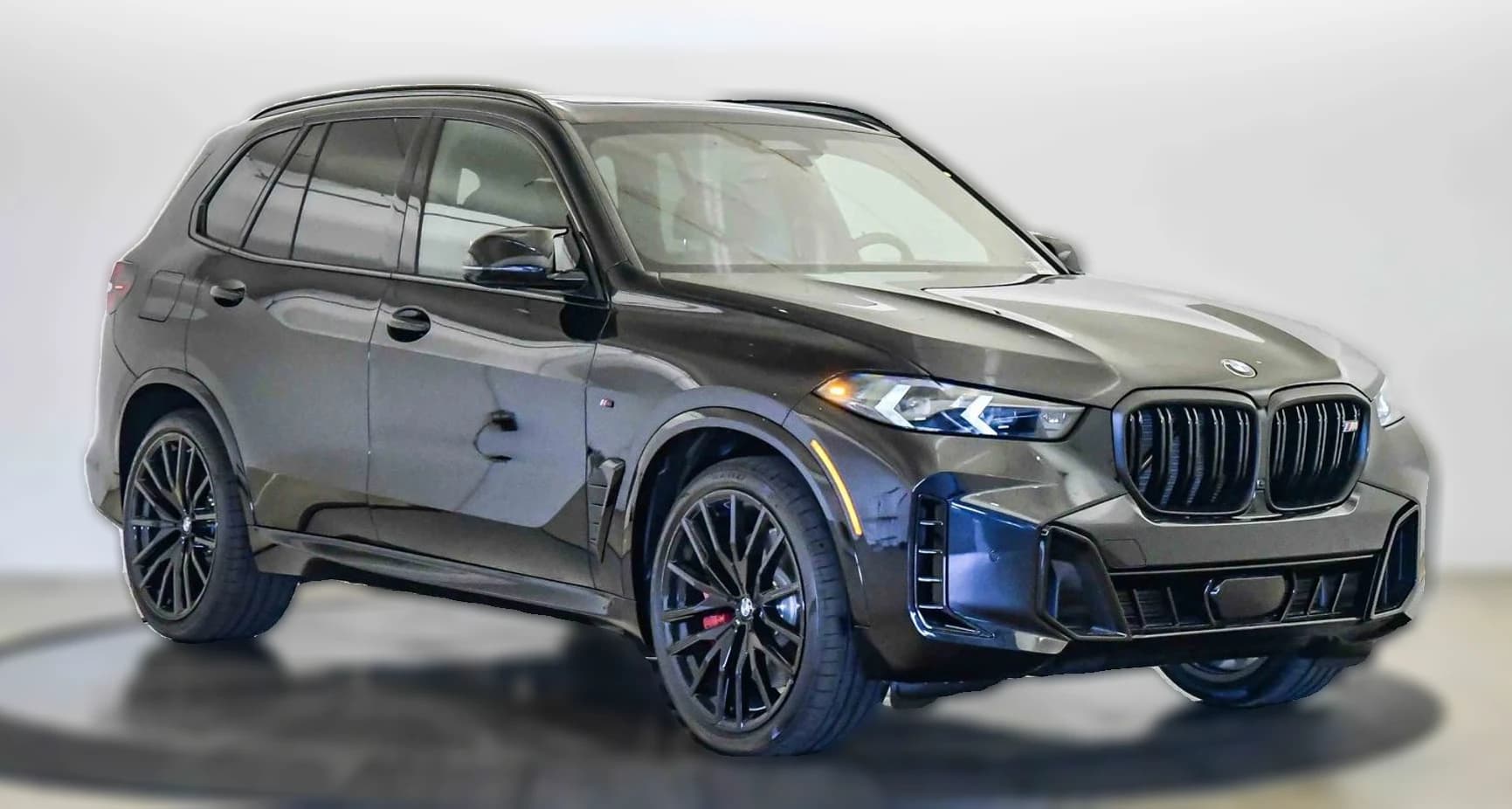 BMW X5 M60i Sports Activity Vehicle 2026 — side view