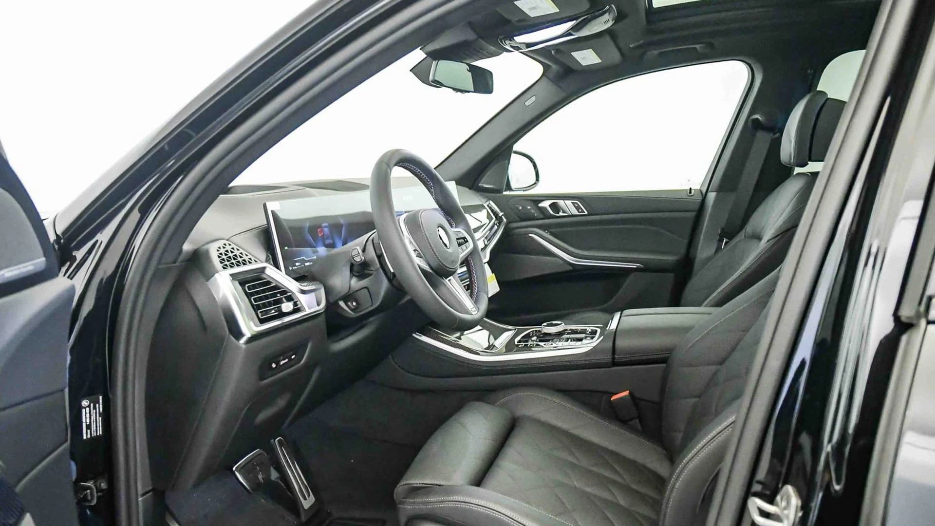 BMW X5 M60i Sports Activity Vehicle 2026 — side view