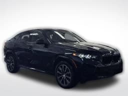 BMW X6 xDrive40i Sports Activity Coupe 2026 — side view