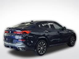 BMW X6 xDrive40i Sports Activity Coupe 2026 — side view