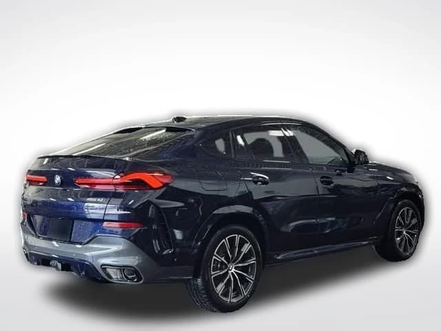 BMW X6 xDrive40i Sports Activity Coupe 2026 — side view