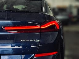 BMW X6 xDrive40i Sports Activity Coupe 2026 — side view