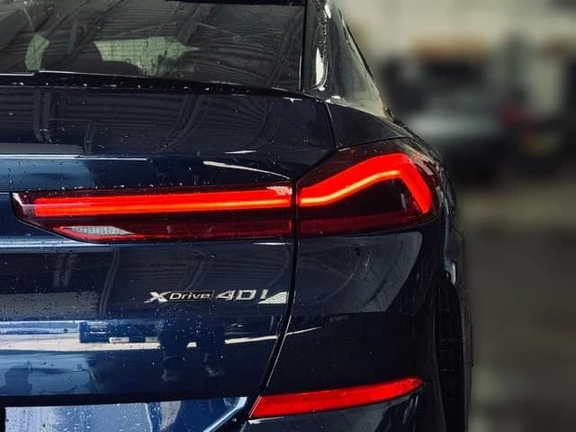 BMW X6 xDrive40i Sports Activity Coupe 2026 — side view