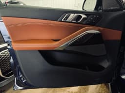 BMW X6 xDrive40i Sports Activity Coupe 2026 — side view