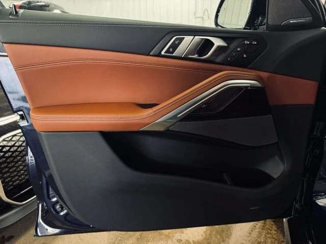 BMW X6 xDrive40i Sports Activity Coupe 2026 — side view