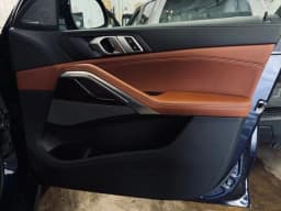 BMW X6 xDrive40i Sports Activity Coupe 2026 — side view