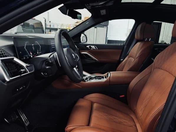 BMW X6 xDrive40i Sports Activity Coupe 2026 — side view