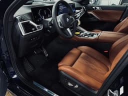 BMW X6 xDrive40i Sports Activity Coupe 2026 — side view
