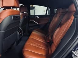 BMW X6 xDrive40i Sports Activity Coupe 2026 — side view