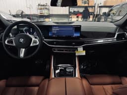 BMW X6 xDrive40i Sports Activity Coupe 2026 — side view