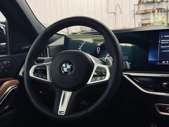 BMW X6 xDrive40i Sports Activity Coupe 2026 — side view