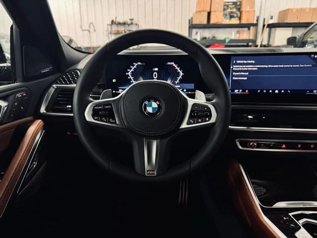 BMW X6 xDrive40i Sports Activity Coupe 2026 — side view