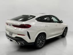 BMW X6 xDrive40i Sports Activity Coupe 2026 — side view