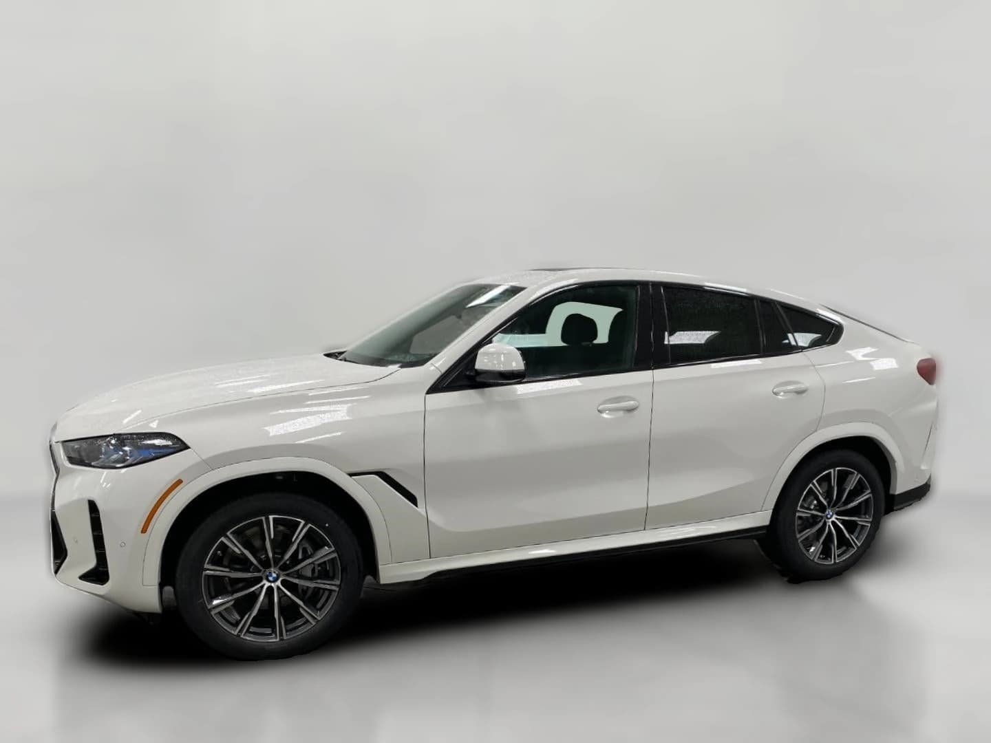 BMW X6 xDrive40i Sports Activity Coupe 2026 — side view