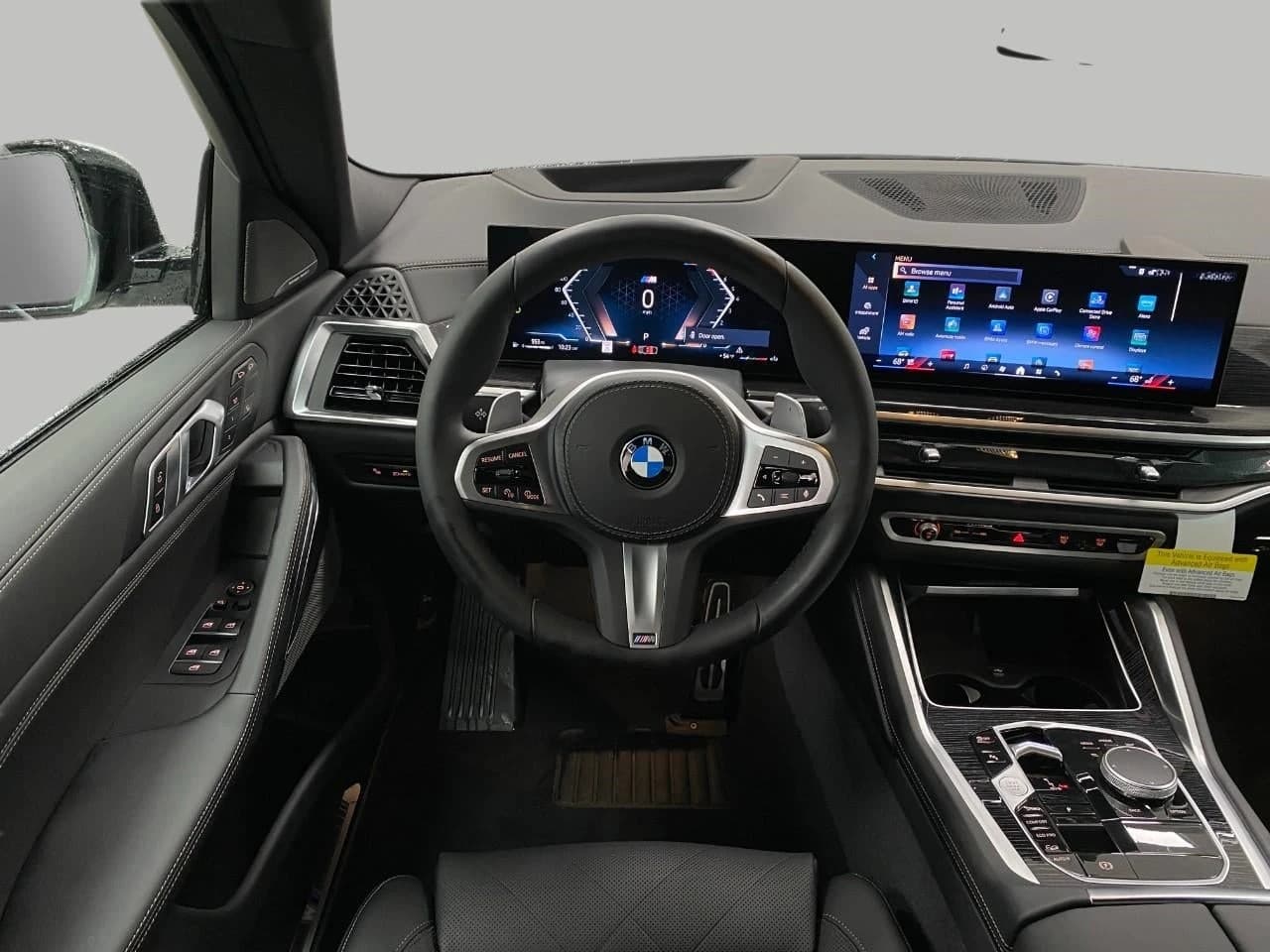 BMW X6 xDrive40i Sports Activity Coupe 2026 — side view