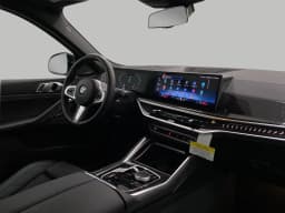 BMW X6 xDrive40i Sports Activity Coupe 2026 — side view