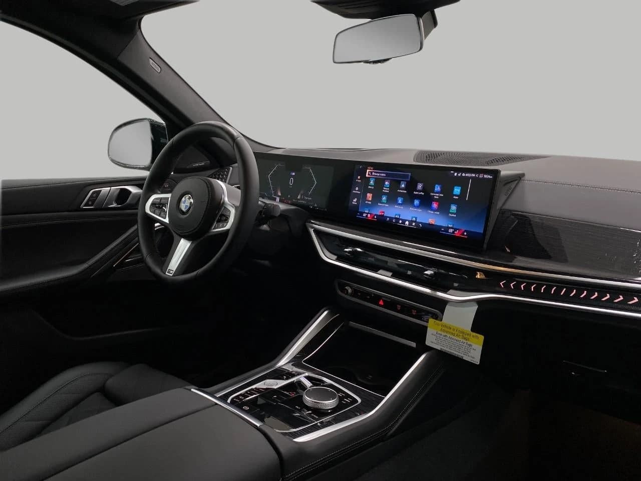 BMW X6 xDrive40i Sports Activity Coupe 2026 — side view