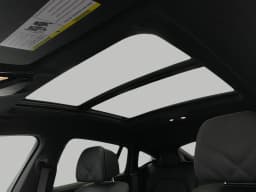 BMW X6 xDrive40i Sports Activity Coupe 2026 — side view