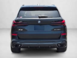BMW X5 xDrive50e Plug-In Hybrid 2026 — side view
