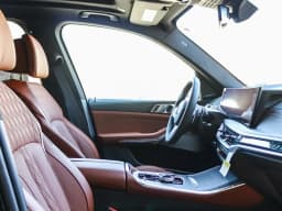 BMW X5 xDrive50e Plug-In Hybrid 2026 — side view