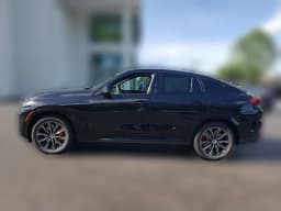 BMW X6 M60i Sports Activity Coupe 2027 — side view