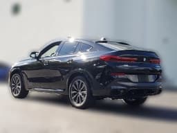 BMW X6 M60i Sports Activity Coupe 2027 — side view