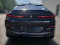 BMW X6 M60i Sports Activity Coupe 2027 — side view