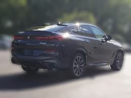 BMW X6 M60i Sports Activity Coupe 2027 — side view